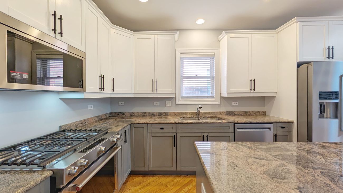 Damen Ave Condo — kitchen, third angle with granite counters