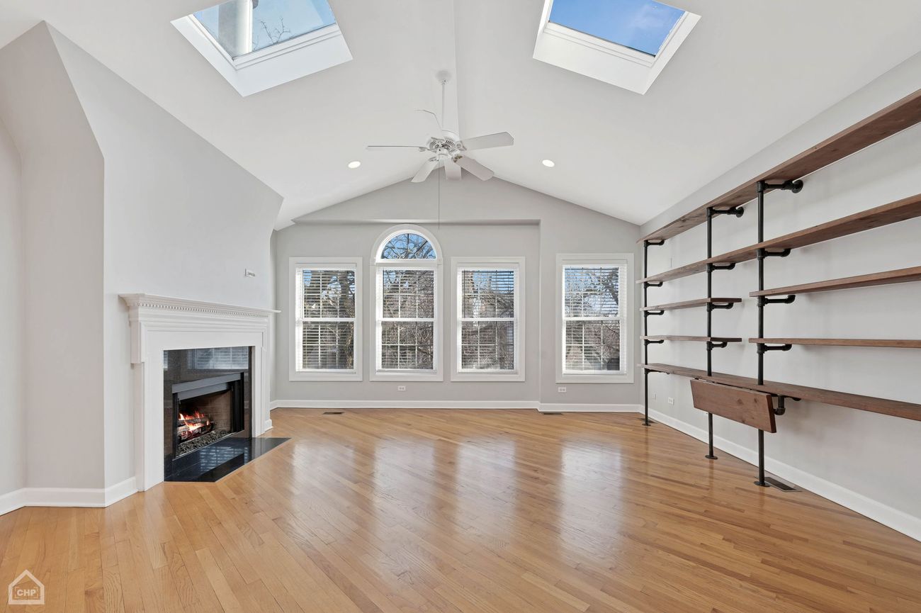 Damen Ave Condo — living room, second angle with built-in shelving