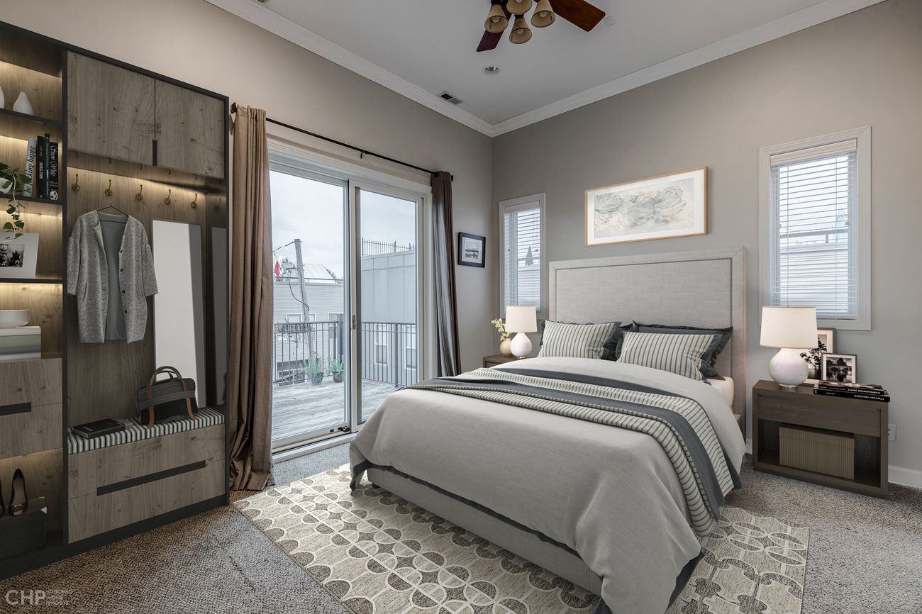 Logan Square 2BD — primary bedroom with deck access