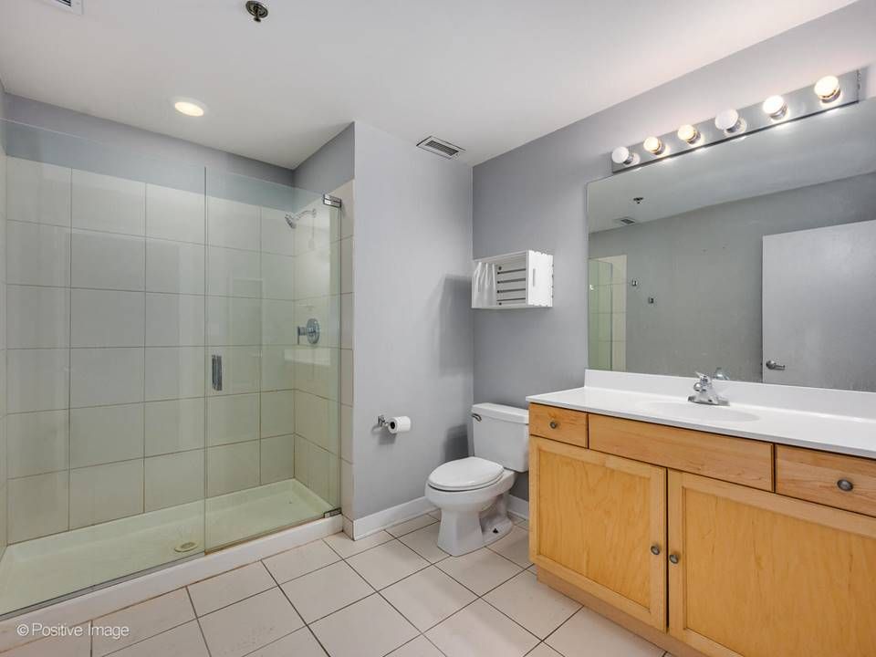 The South Leavitt — bathroom with glass-enclosed shower