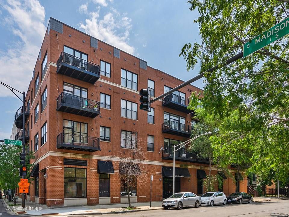 Corner exterior of The South Leavitt brick condo building