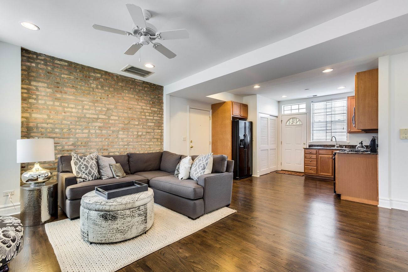 Troy St — living room with wall-mounted TV