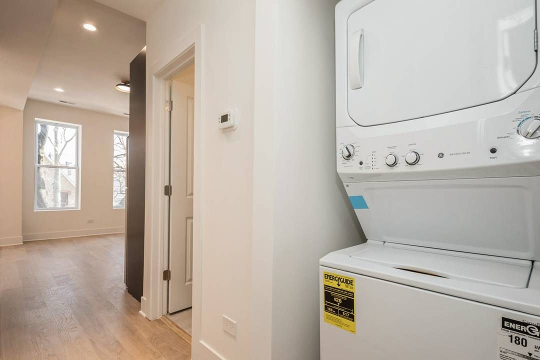 Wicker Park 3 Flat — Unit 2 in-unit washer/dryer and hallway